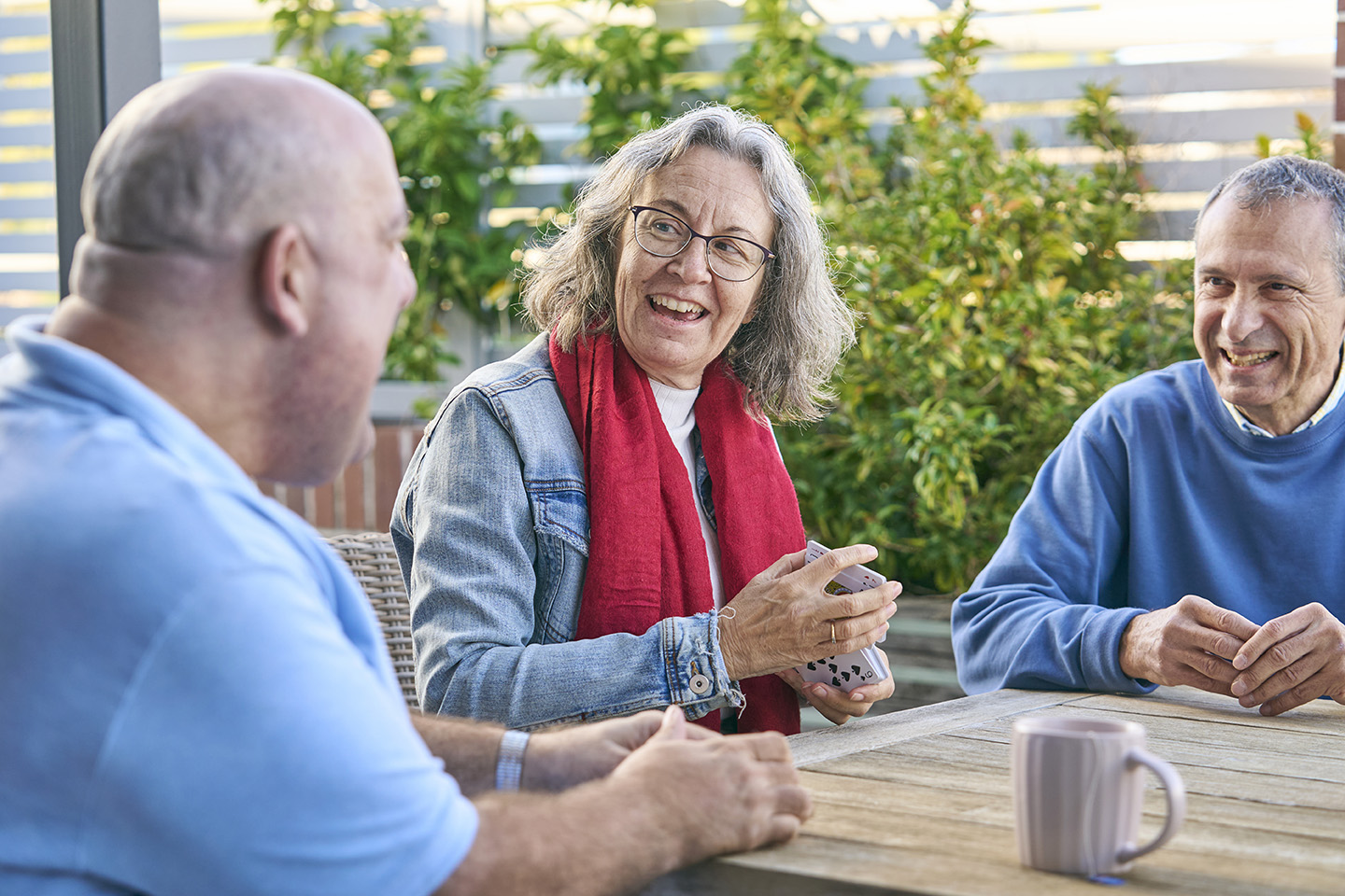 clients sittnig at table smiling